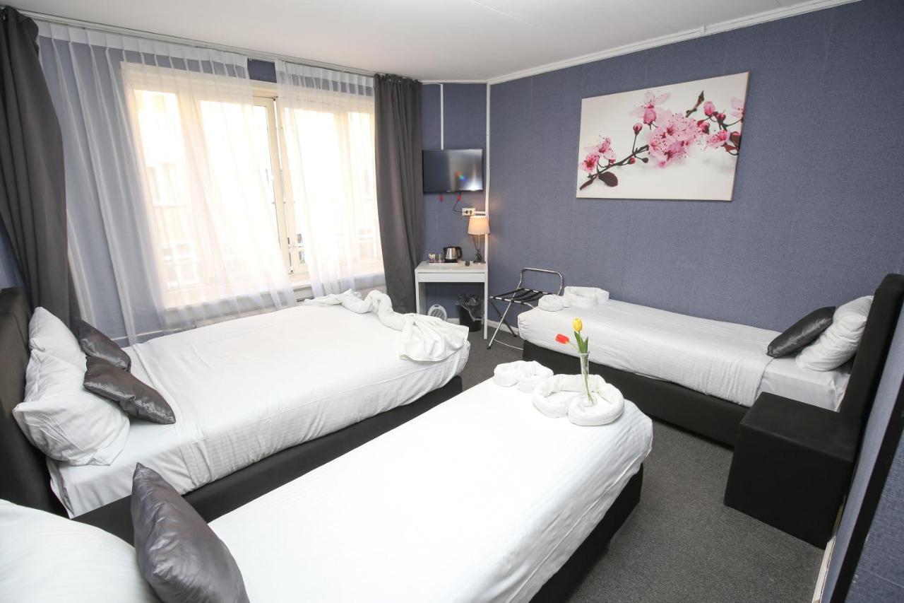 Chambre Quadruple avec Salle de Bains Privative